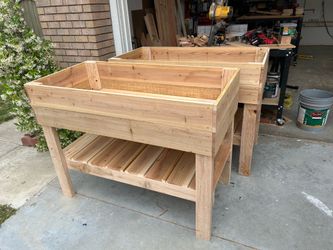 Elevated planter with bottom shelf