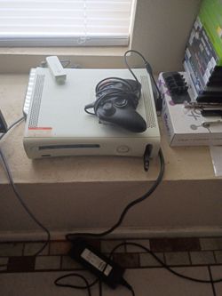 Xbox 360 with two controllers