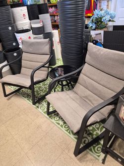 New 3 piece outdoor patio set. Two rockers with glass side table