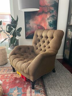 Comfortable armchair with ottoman