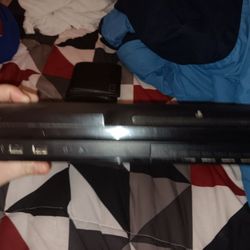 Black PlayStation 3 And and a brand new PlayStation 4.