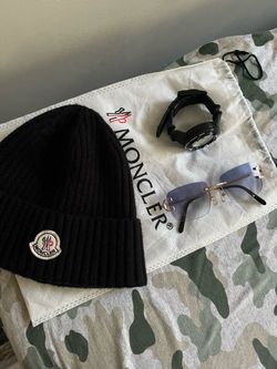 Monclere , black citizen eco drive Godzilla , Cartier glasses