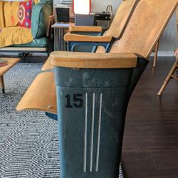 Vintage cast-iron and wood theater seats
