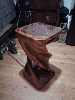 23" hand carved table. One solid piece.