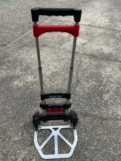 Folding hand cart. New. 42” high. 12” plate
