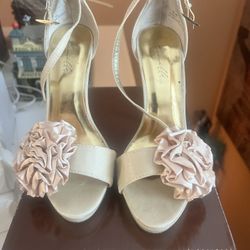 Step out in style with these elegant champagne heels. Perfect for any occasion, these shoes offer both comfort and sophistication. Heels 4 inches FYI