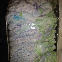 12 Size Six Luvs Diapers