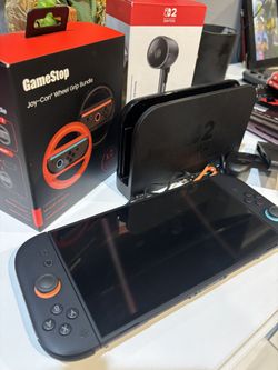 Used Nintendo Switch 2 With Camera And Wheel Grip No Games
