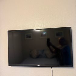 QUEEN BED &  RCA SMART TV
