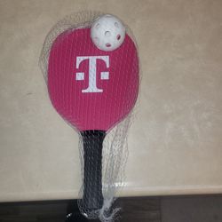 T mobile pickle ball rackets and ball.