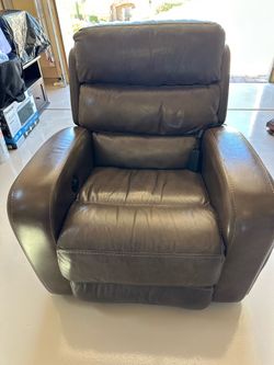 Power rocking recliner