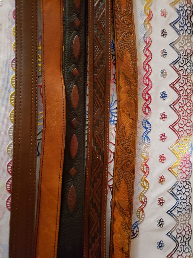 Assortment Of Mens Leather belts Designs. 44 Inches Long Some With Buckles Some Without $ 7.00 Each