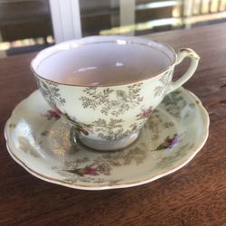 Vintage teacup Hand Painted With roses On It 