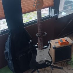 Beginner's Electric Guitar, With Stand, Speaker, And Travel Case