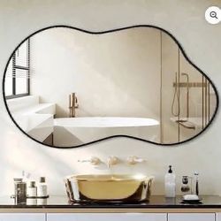 ☁️ **xCloud Wall Mirror – 46” x 26” – Black Frame** ☁️  💲 **$100**  Add a stylish statement piece to your home with this **irregular cloud-shaped wal