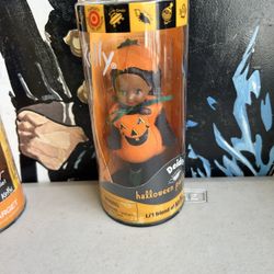 2000 Mattel Kelly Surprise Halloween Party Deidre doll, a Li'l Friend of Kelly, dressed as a pumpkin