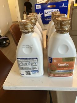 6 jugs of 1 quart Similac sensitive