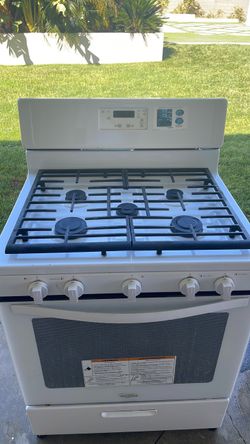 Whirlpool gas stove. Less than six months old.