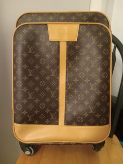 Louis Vuitton Monogram Rolling Suitcase Carry-On - Authentic LV Luggage (Used)Genuine Louis Vuitton monogram canvas rolling suitcase