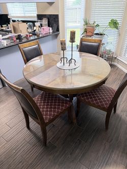 Round Dining table with tempered glass top - Good cond, minor scratches on bottom