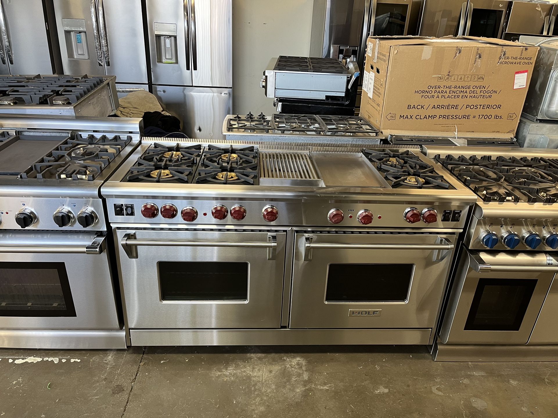60” WOLF STAINLESS STEEL STOVE WITH 6 BURNERS / GRILL AND GRIDDLE