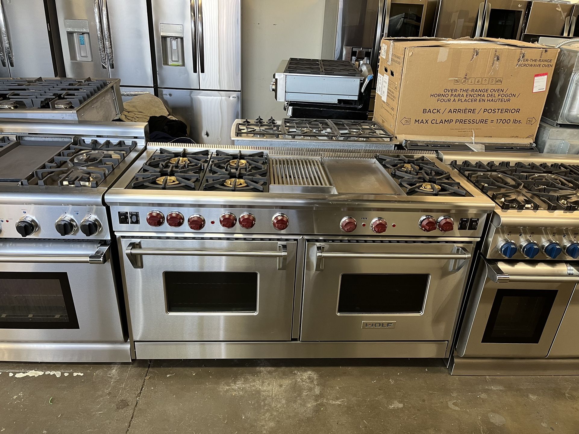 60” WOLF STAINLESS STEEL STOVE WITH 6 BURNERS / GRILL AND GRIDDLE 