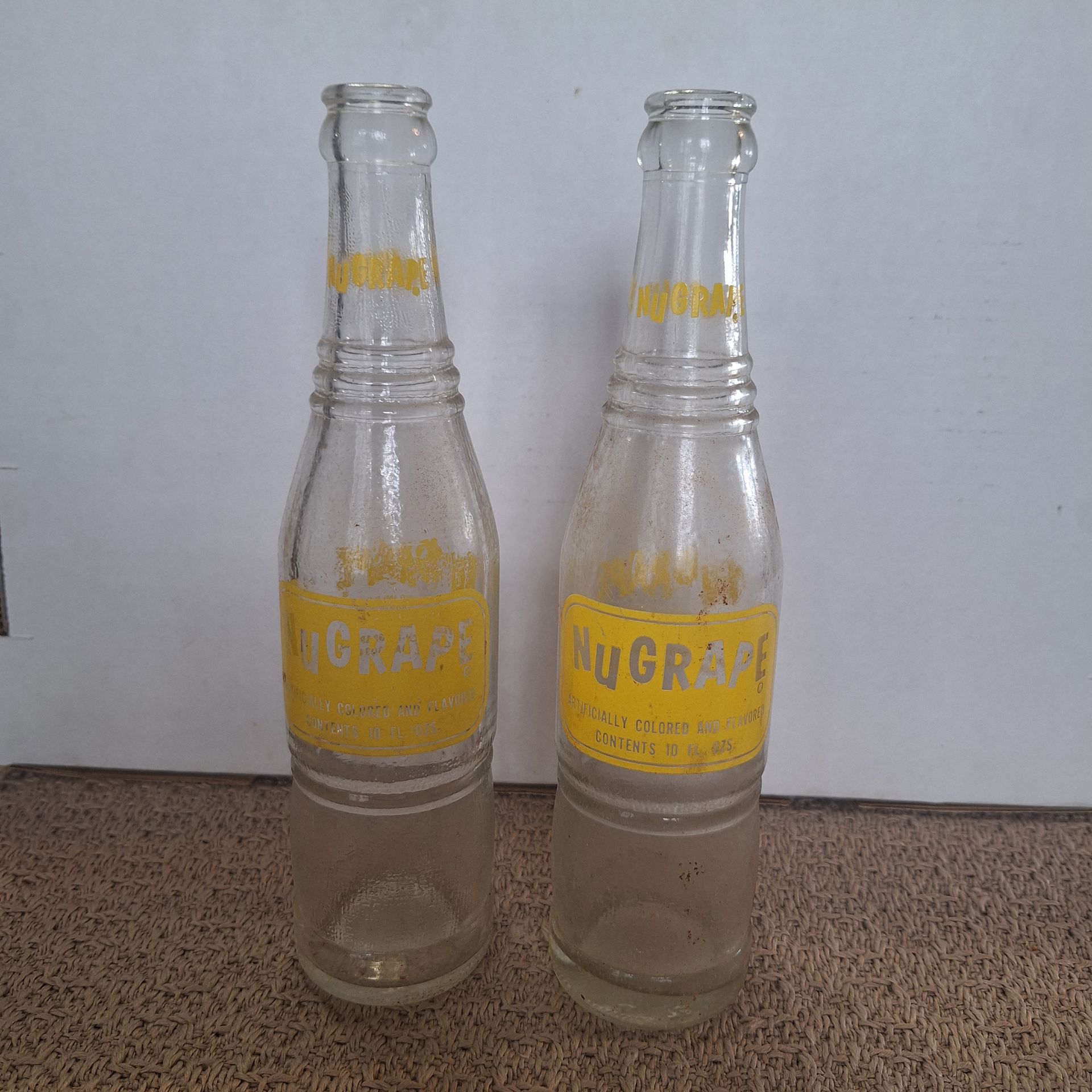 PAIR OF RETRO NUGRAPE SODA BOTTLES
