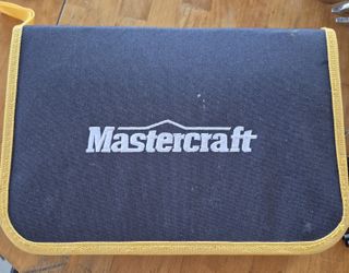 Compact Mastercraft cordless screwdriver with case.
