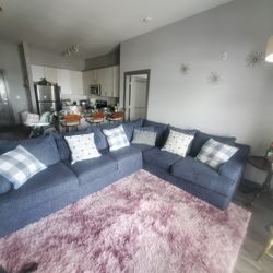Beautiful blue sectional sofa from Room to Go. 