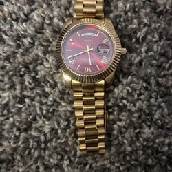 Gold Watch Red Face 