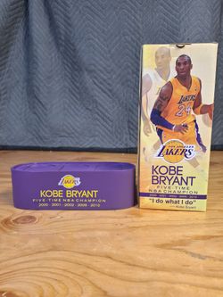Stand for Kobe Bryants Retirement Season Bobblehead Set.