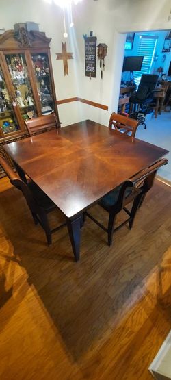 Pub height table with 4 chairs