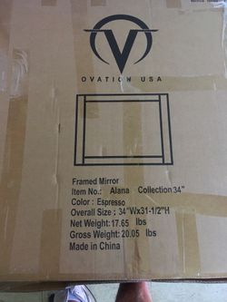 Brand new mirror still in box 34 wide by 31 1/2 height