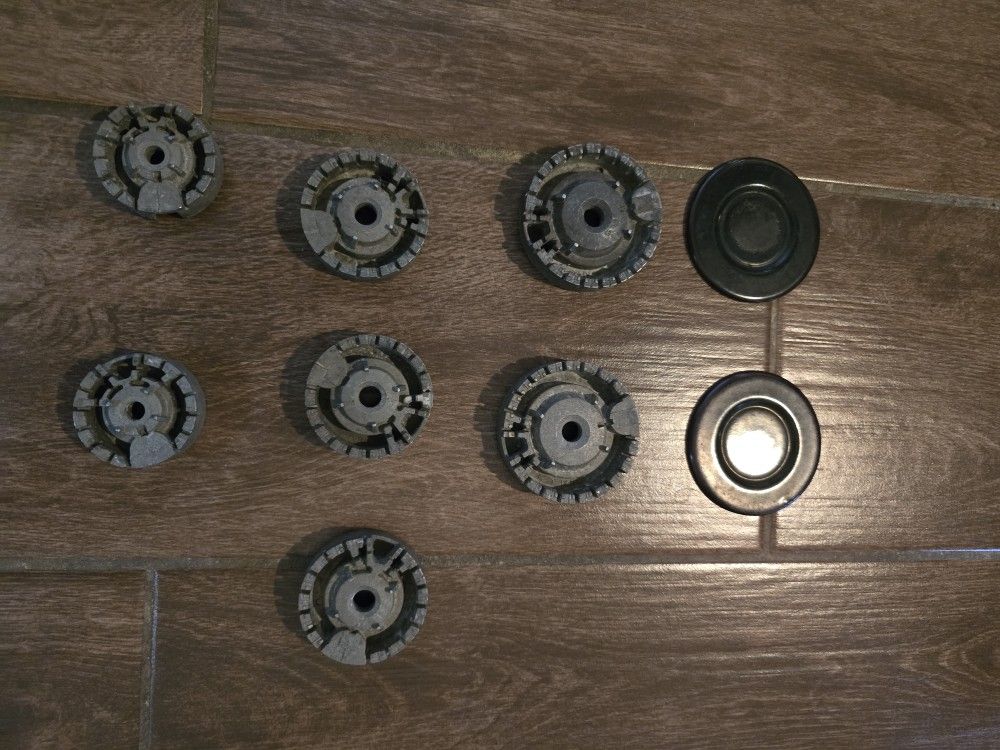 Gas Stove Top Part $10 Ea. (Kitchen Island)
7 circle, gray, burners. And 2 cover burners.
3 BURNER BASE RANGE size: 2 3/4"
2 BURNER BASE RANGE size: 2