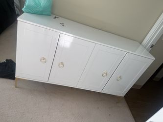 Gold and white cabinet