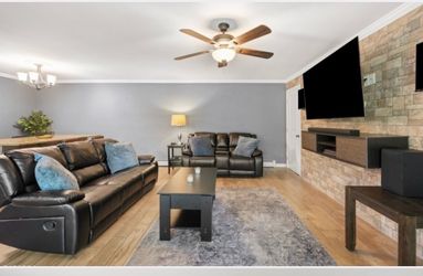 Faux Leather Manual Reclining Sofa and Loveseat with Storage