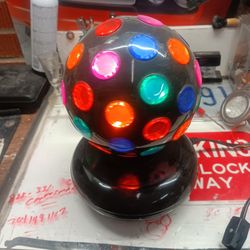 Spinning Disco Ball Lights Up The Room