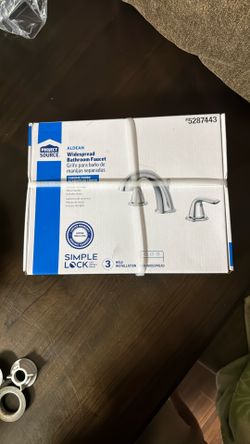 2 Brand new 1 never opened widespread bathroom faucet