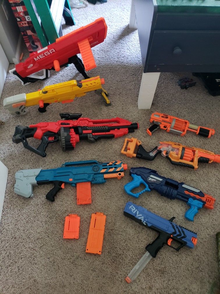 Lot Of 24 Collectible Nerf Guns