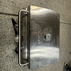 Never used portable grill cuisinart