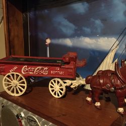 Coca-Cola and iron cast antique toys set