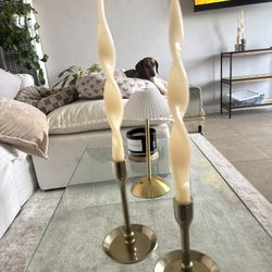 Gold Candlestick Holders And Candles 