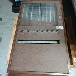 Antique candy/ cigarette vending machine