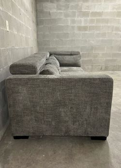 Gray couch in good condition - pet free and smoke free house