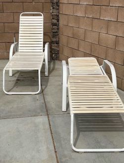 Pool chairs.   Portable crib. Tv stand