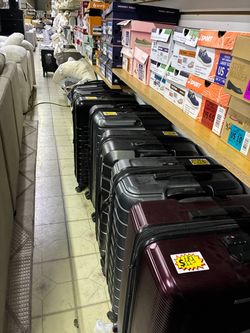 Samsonite and Delsey Hardside Suitcases