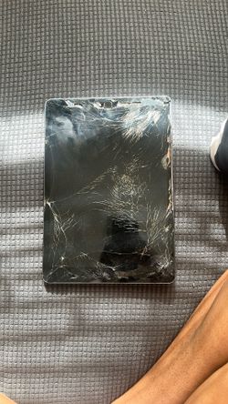 Cracked iPad (go to iphone doctor to get screen fixed)