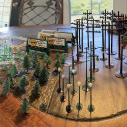 Welcome To PLASTICVILLE! See The Forest! See The Guy Repairing The Telephone Poll!