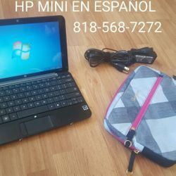 Mini laptop hp in spanish great condition with charger and case