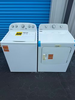 New top-load washer and dryer. Whirlpool, Maytag.